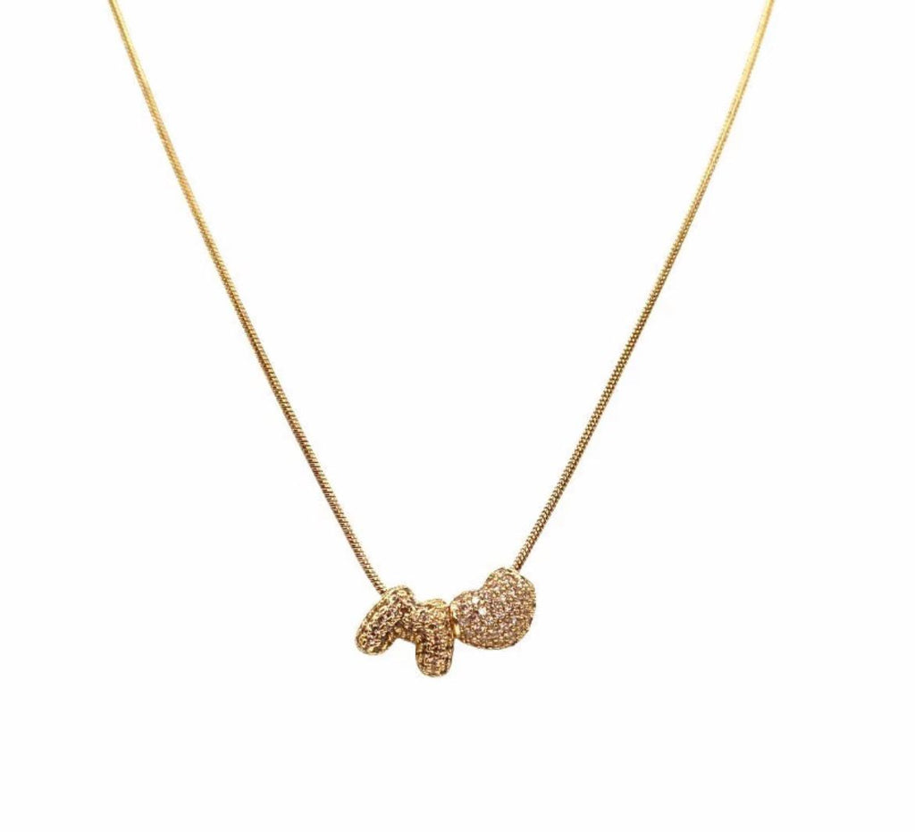 Collana Gold acciaio inossidabile con cuore e lettere in ottone radiato con strass