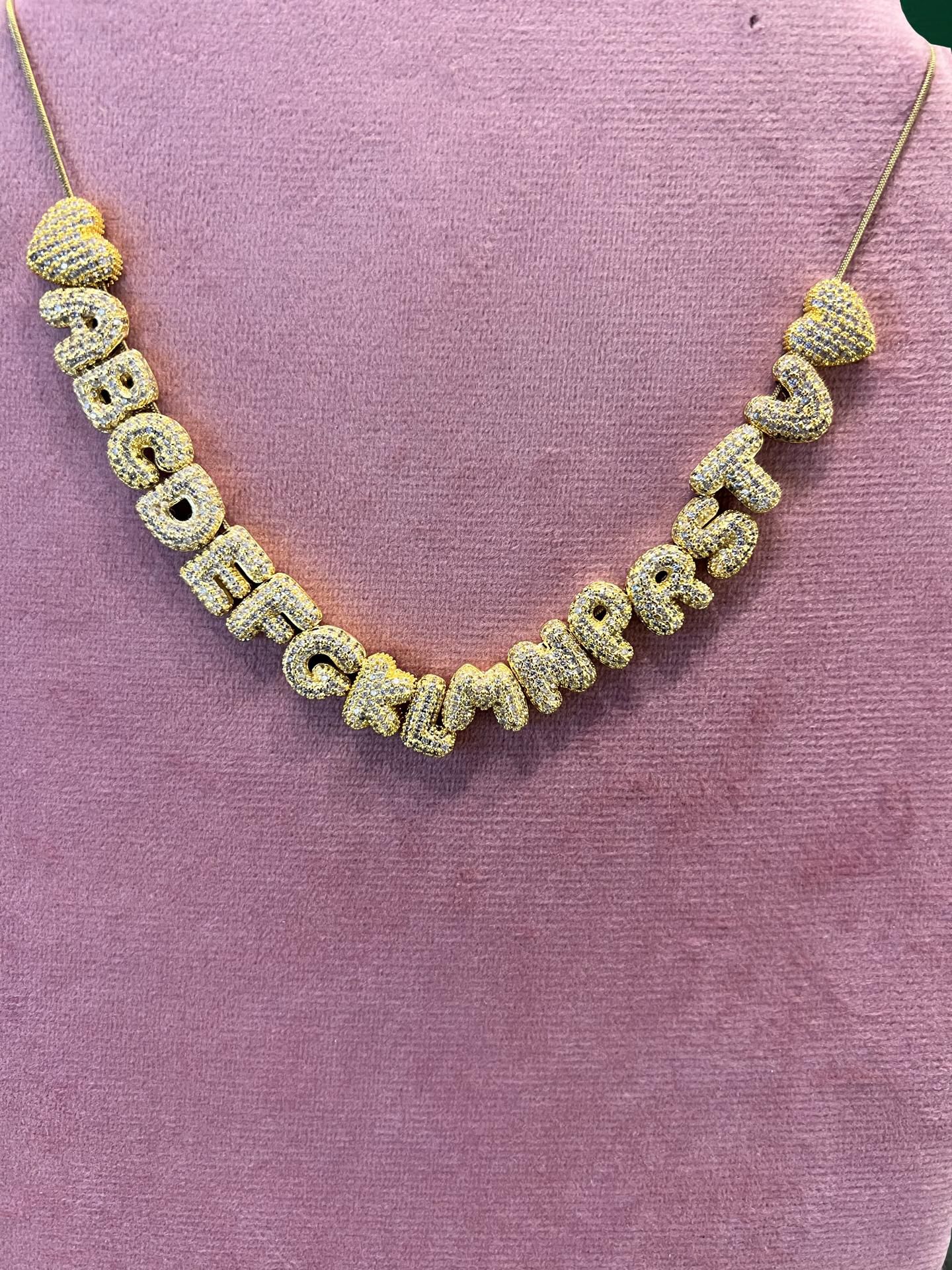 Collana Gold acciaio inossidabile con cuore e lettere in ottone radiato con strass